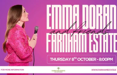Woman in pink holding microphone on stage, purple background, entertainment event at Farnham Estate, 8th October.
